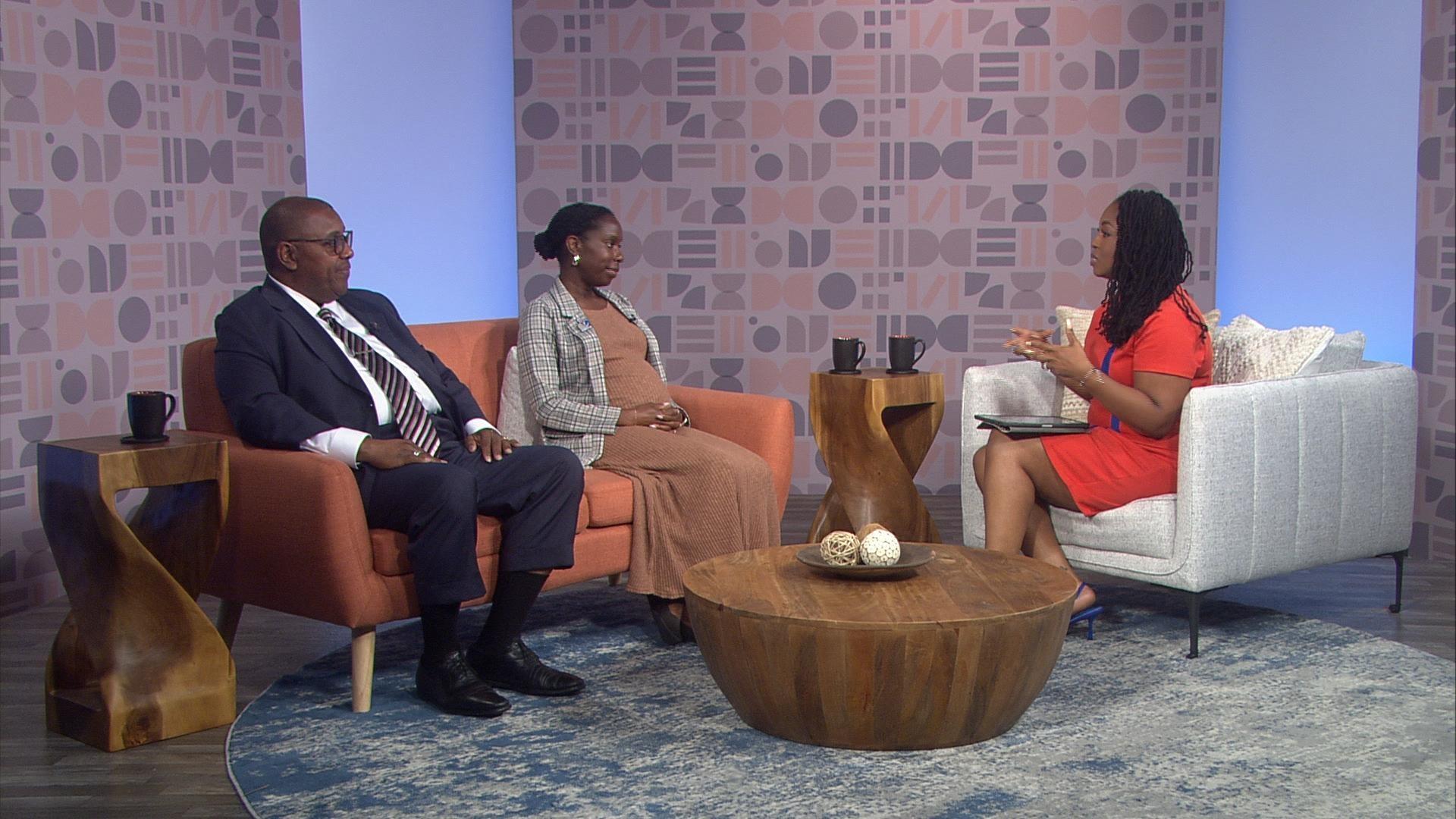 Host Kenia Thompson and two guests sit together in studio