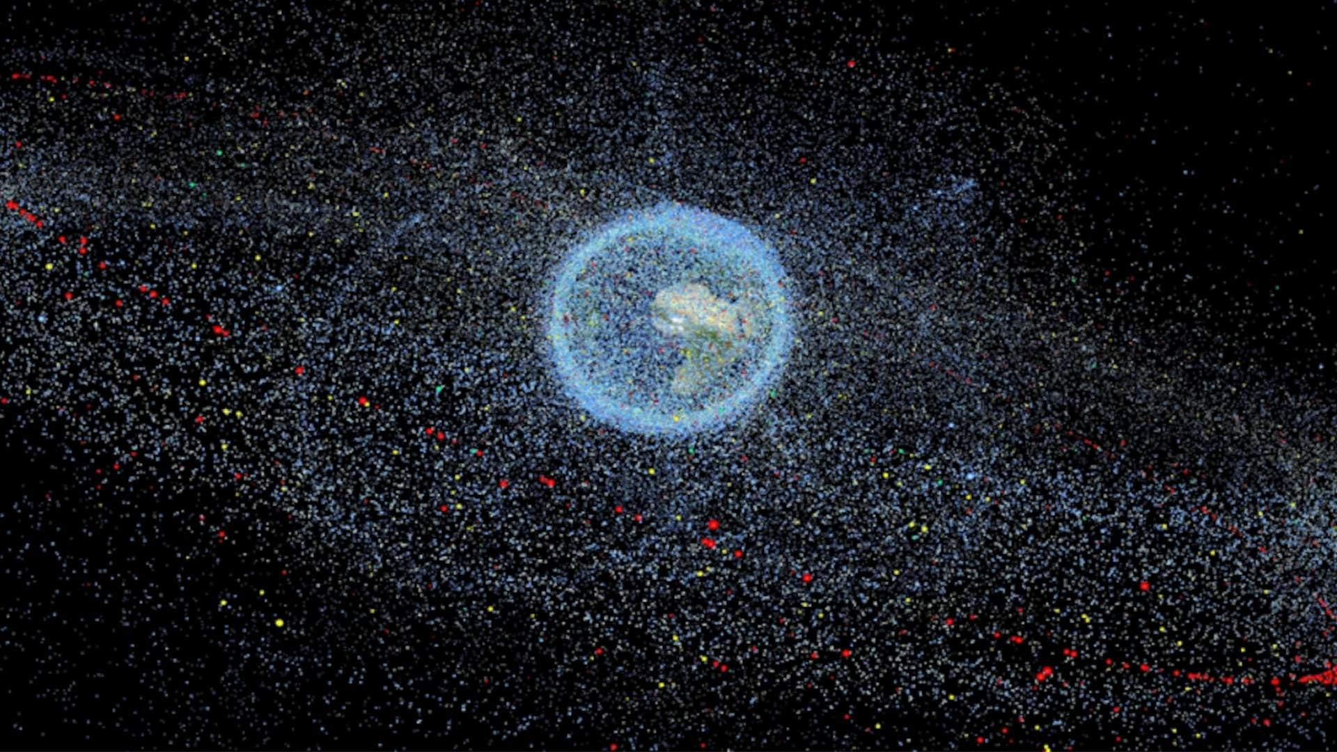 A graphic of space debris orbiting around the earth.