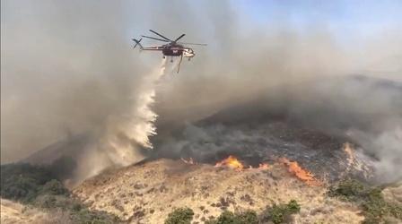 Video thumbnail: PBS NewsHour Flames burn through Southern California's San Bernardino