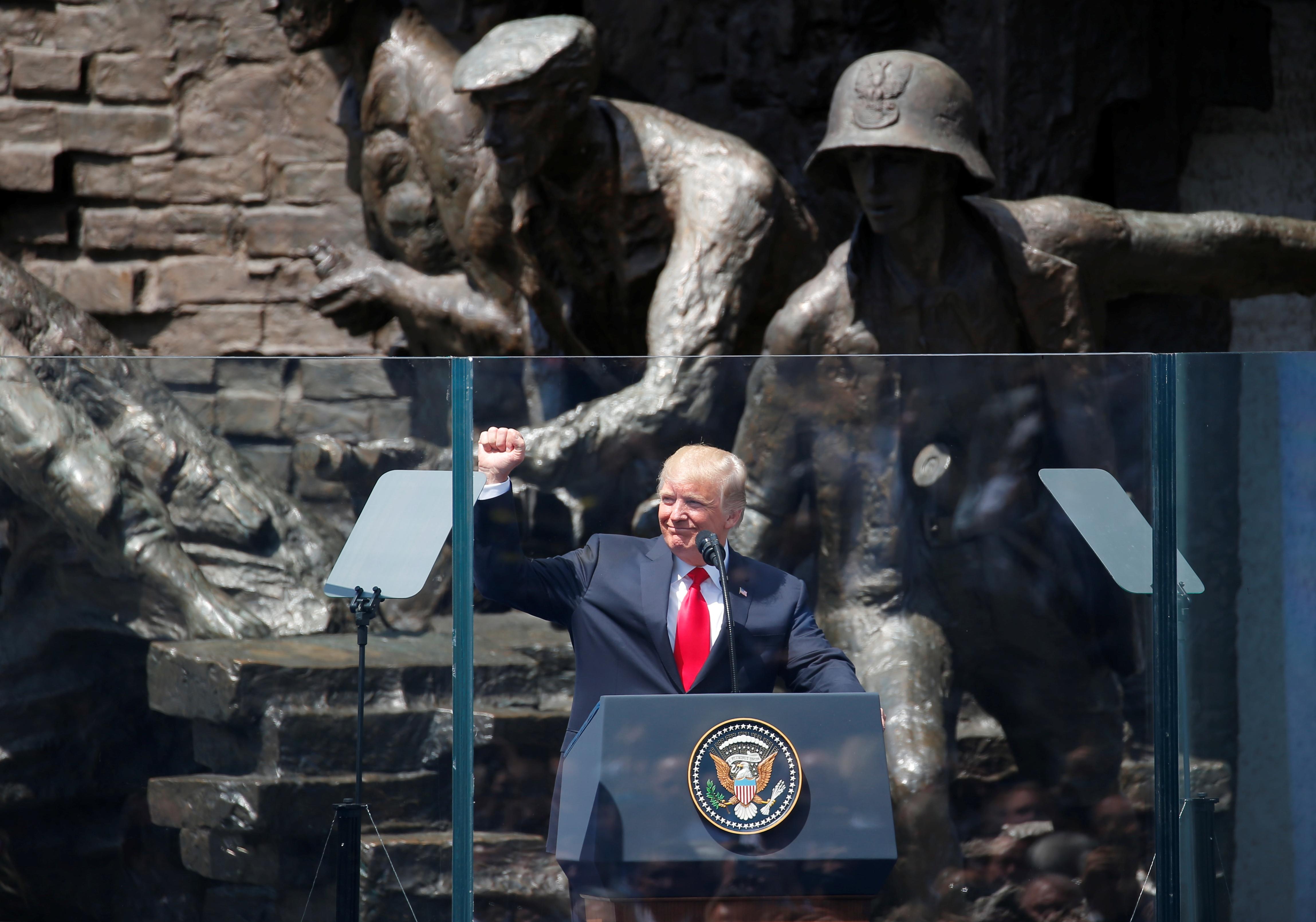 In Poland, Trump chides Russia on eve of Putin meeting