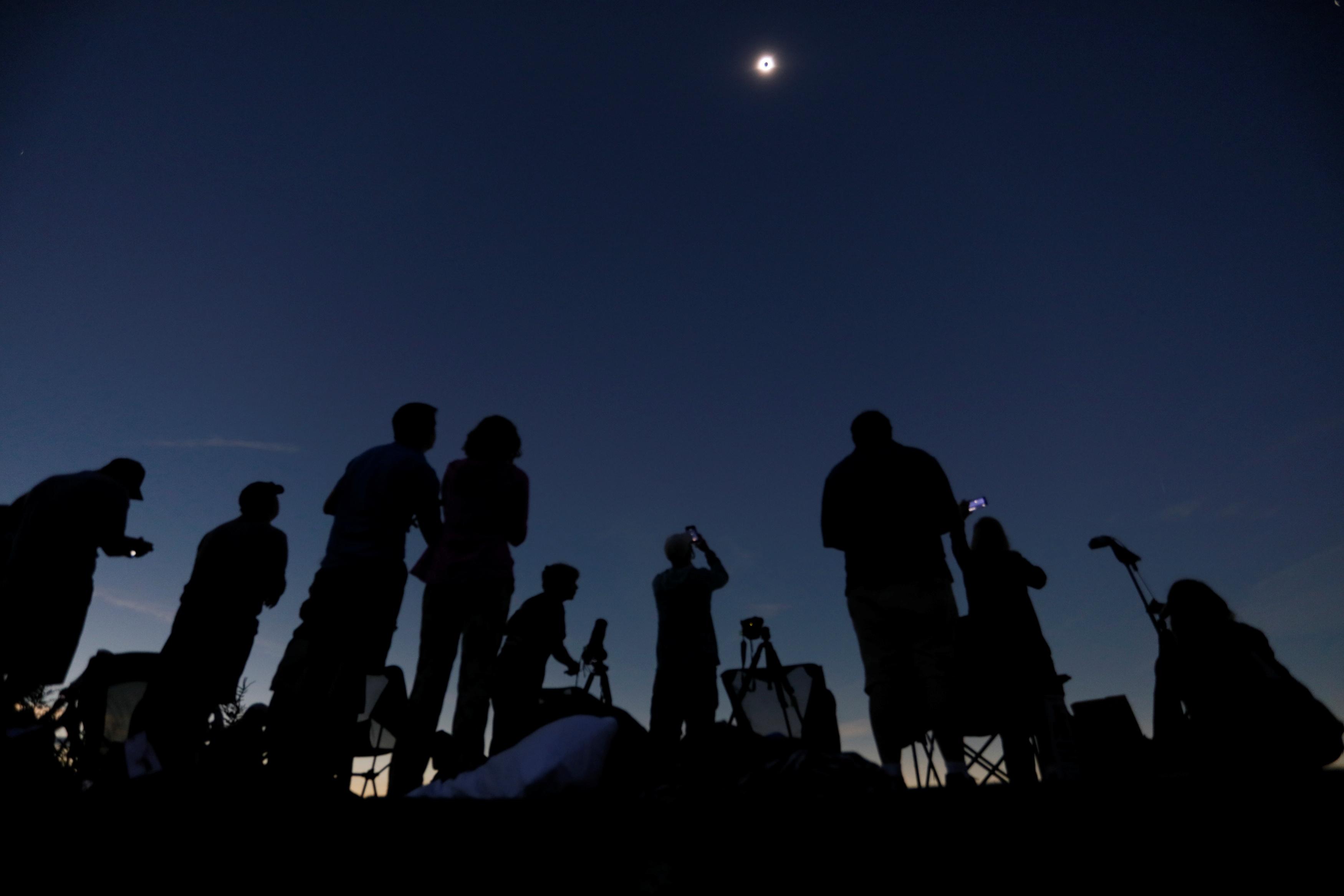Millions of skygazers marvel at a historic American eclipse