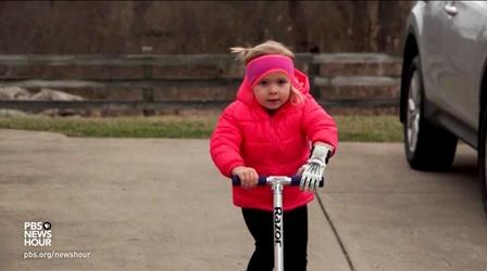 Video thumbnail: PBS NewsHour How a 3-D printed hand gave this girl the gift of play