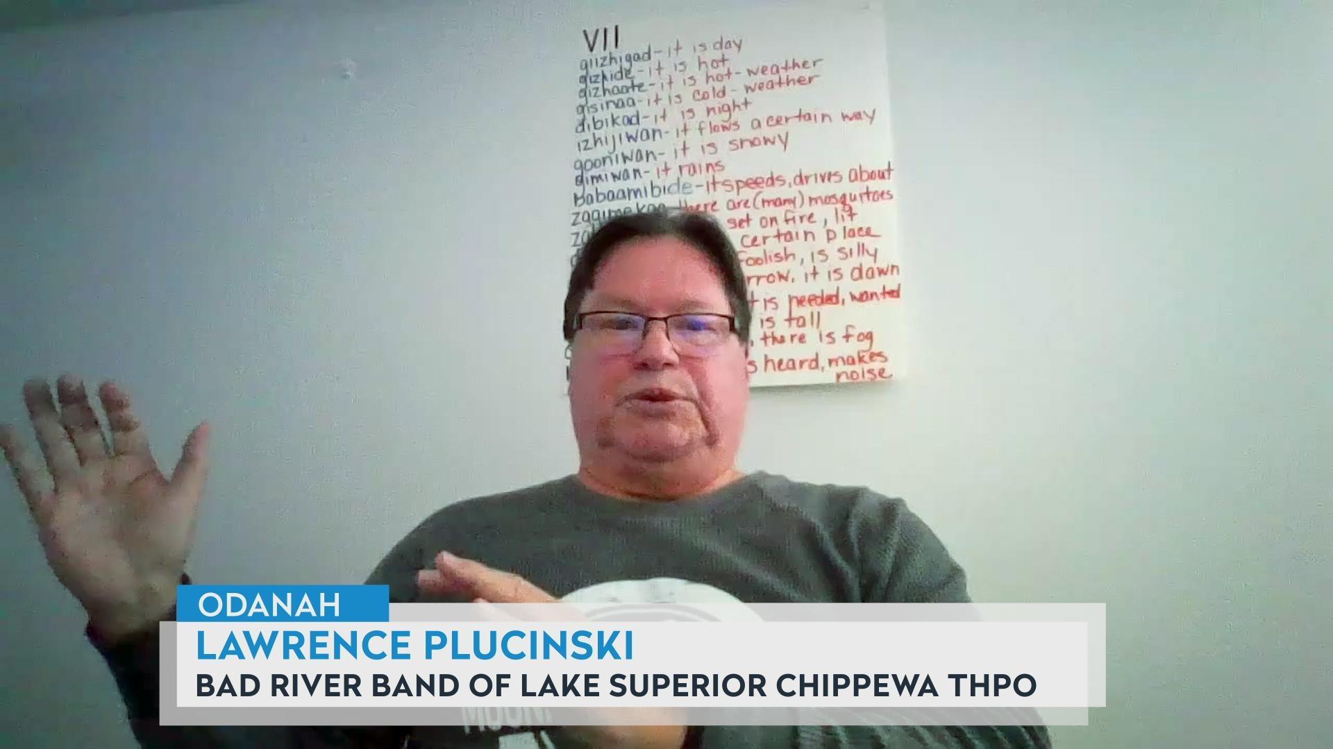 Lawrence Plucinski on Lake Mendota’s fleet of ancient canoes