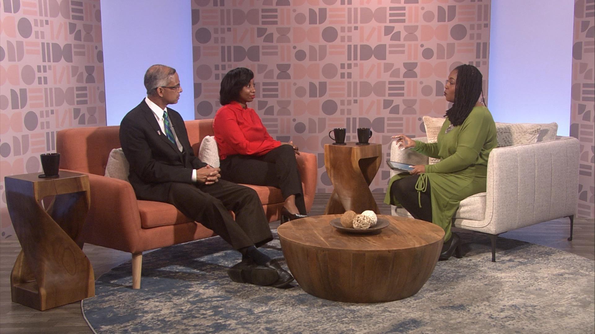 Host Kenia Thompson and guests on set.