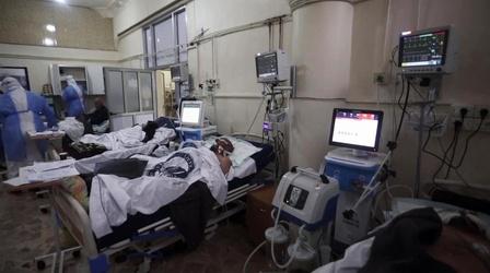Video thumbnail: PBS NewsHour COVID-19 takes hold in Syrian opposition's last stronghold