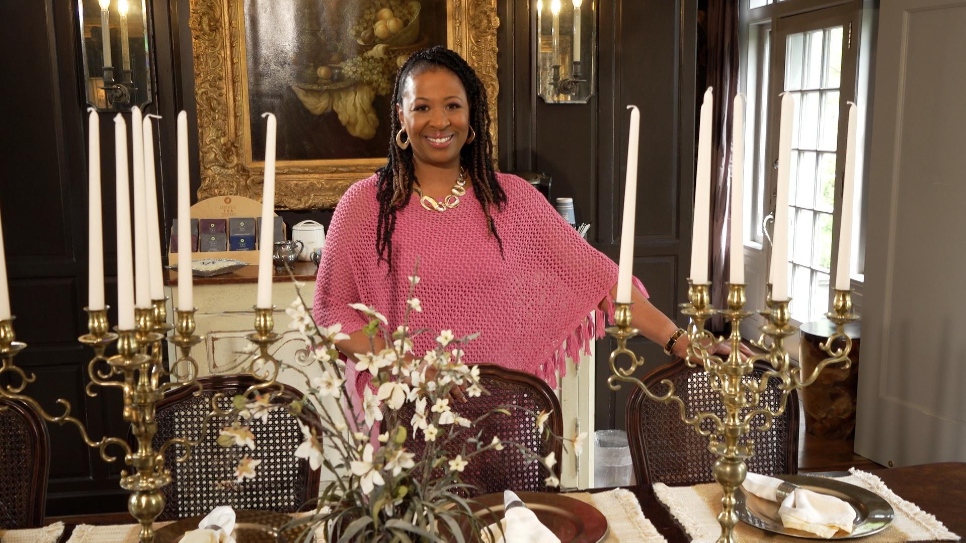 Deborah Holt Noel inside on a colonial styled hotel.