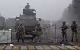 Kazakh president orders troops to 'shoot to kill' protesters