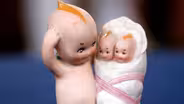 Appraisal: Action Kewpie Doll "Down on His Luck", ca. 1915