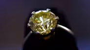 Appraisal: 1976 Fancy Intense Yellow Diamond Ring