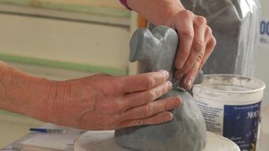 Ceramic artist Susan Garson builds a bird menorah