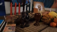 Malik Seneferu dresses Kwanzaa table
