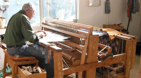 Jim Bassler weaving on the loom