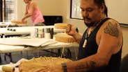 Nisga'a Artist Mike Dangeli sings a victory song
