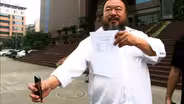 Never Sorry: Ai Weiwei Weaves Red Tape into Art