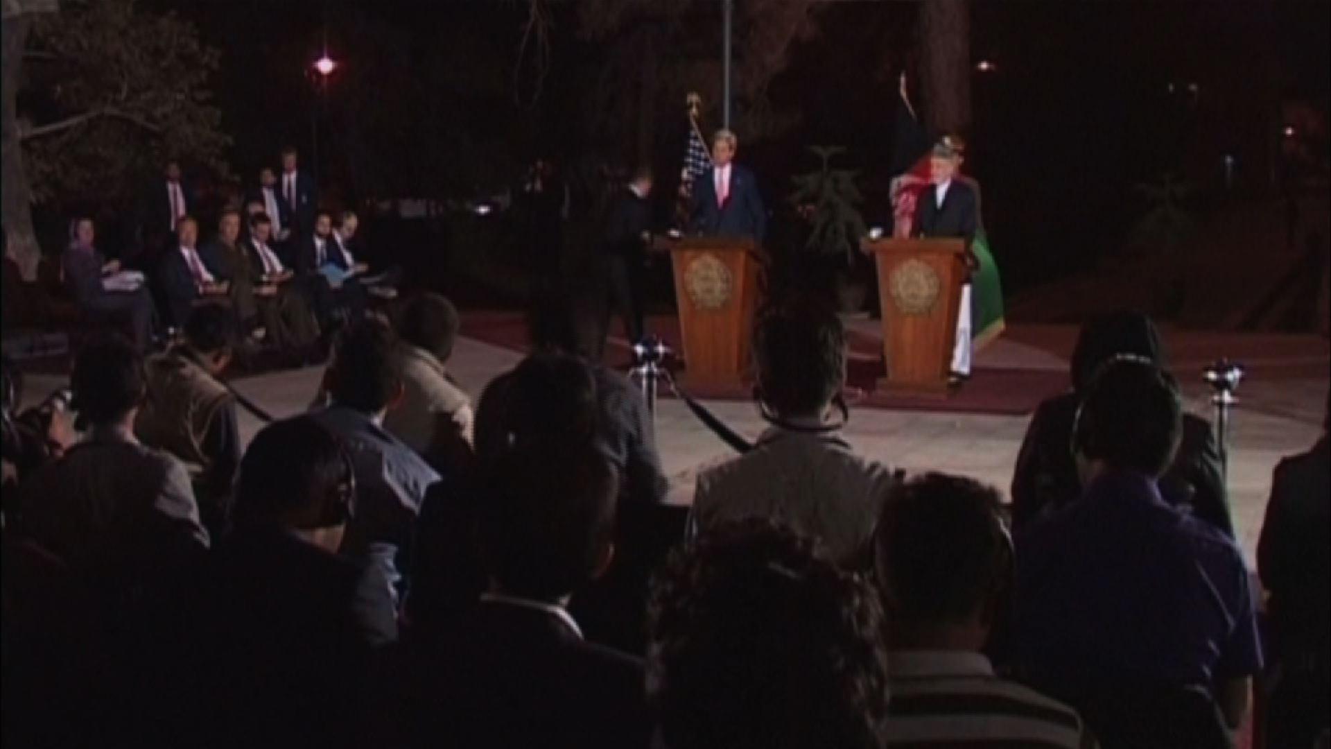 Kerry, Karzai resolve parts of security deal 