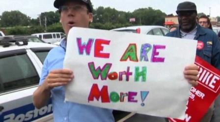 Video thumbnail: PBS NewsHour Workers protest low pay, but some argue increases kill jobs