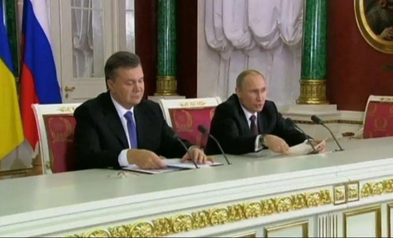 Putin's economic bailout for Ukraine angers protesters 
