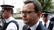 British editor begins sentence for phone hacking charges
