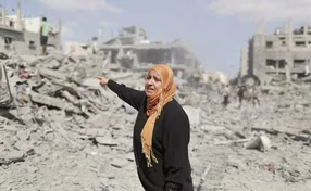 During cease-fire, Gaza residents survey destruction
