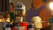 Robot sculptures feed the homeless in Phoenix