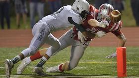 Video thumbnail: PBS NewsHour Weighing the health costs of high school football