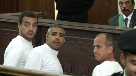 Video thumbnail: PBS NewsHour What’s next for two journalists still imprisoned in Egypt?