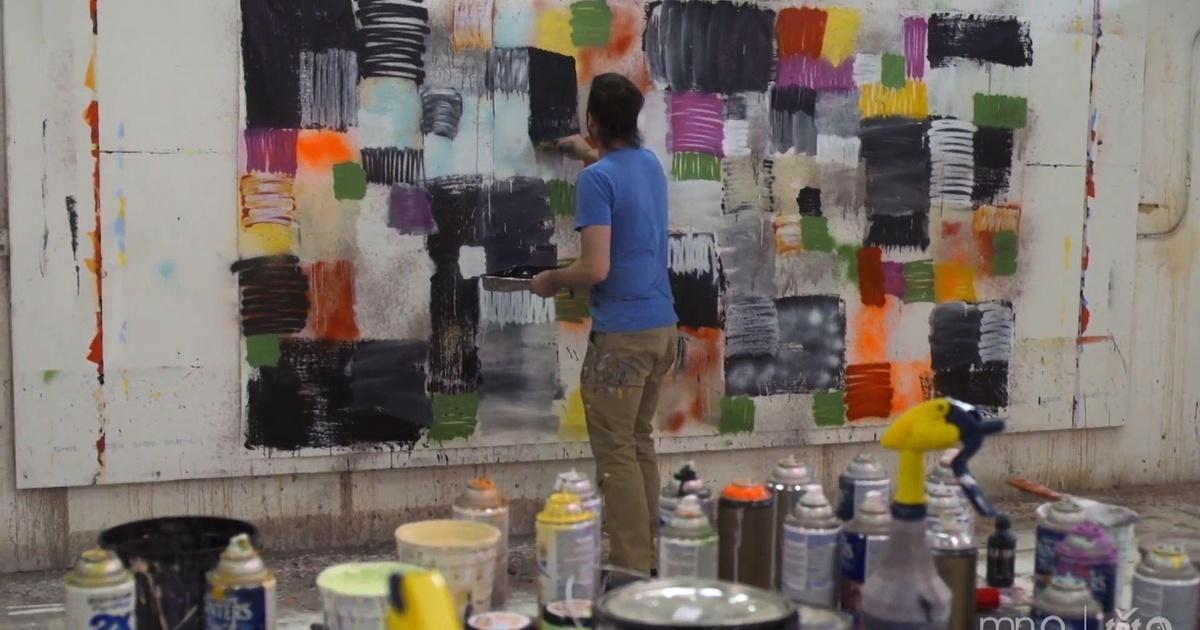 PBS News Hour | Artist layers ads, vintage cartoons like decaying billboards | Season 2015