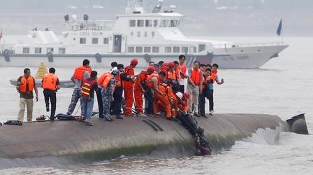 Video thumbnail: PBS NewsHour News Wrap: Divers race to rescue passengers on cruise ship