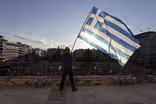 Awaiting debt deal, Greeks resist expected reforms