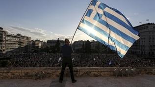 Awaiting debt deal, Greeks resist expected reforms