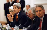 Tense and fatigued, negotiators extend Iran nuclear talks