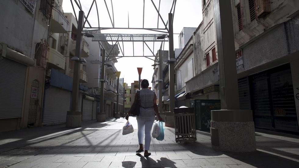 Puerto Rico debt crisis drives exodus to U.S. image