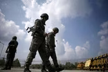 North and South Korea hold talks amid military standoff