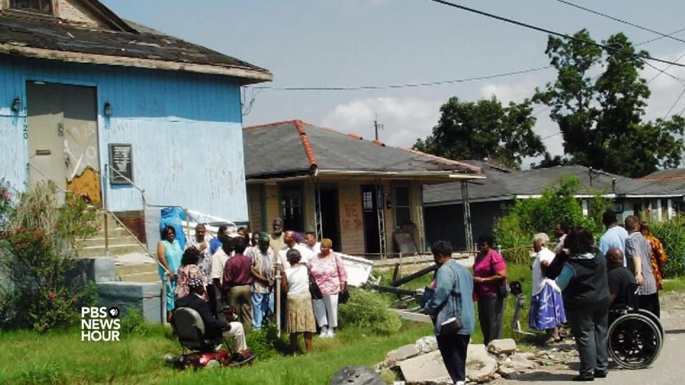 Wiped out by Katrina, church carries on in a living room image