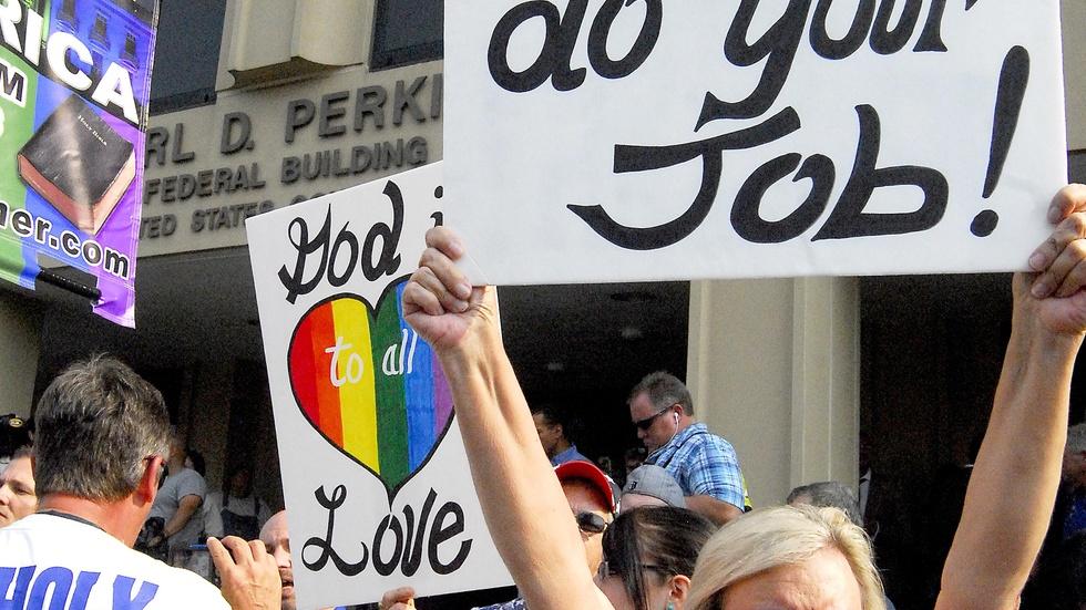 Embattled Kentucky clerk draws outrage and support image