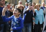 What is Germany doing to help migrants?
