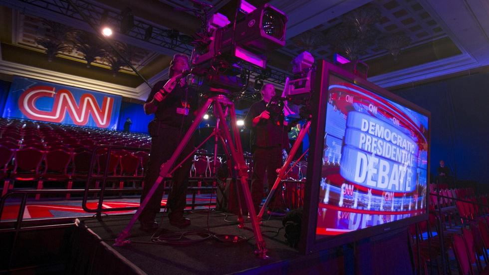 Biden won’t be on the stage, but will he impact the debate? image