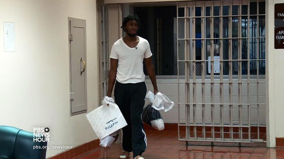 Can a pilot program keep prisoners from going back to jail? image