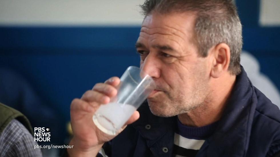 Greeks find tax hike on a traditional liquor hard to swallow image