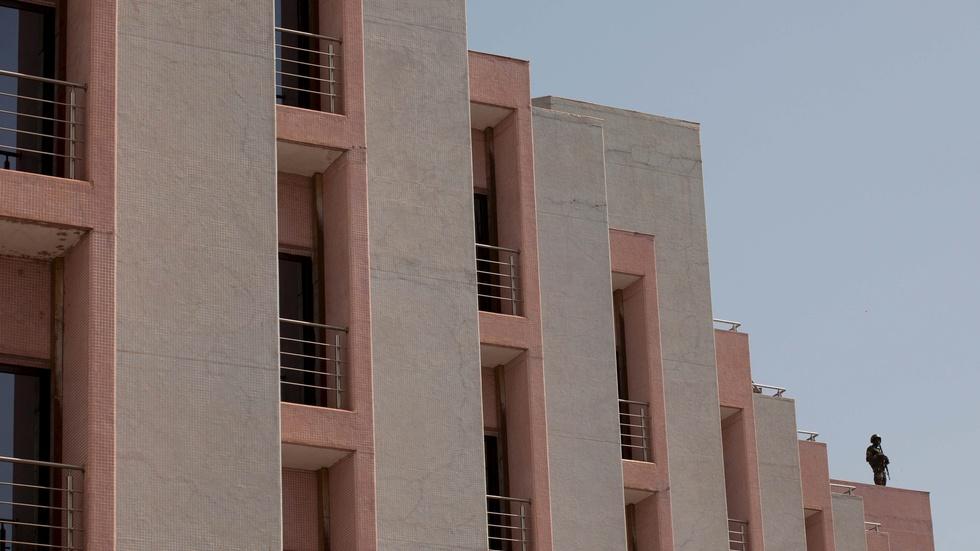 The latest on the Mali hotel attack image