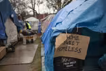 Residents react as their tent city is dismantled