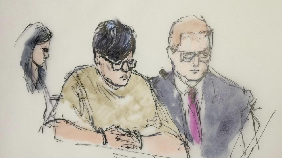 News Wrap: San Bernardino weapons suspect held without bond image