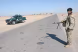 Afghan forces battle Taliban with help from U.S. airstrikes