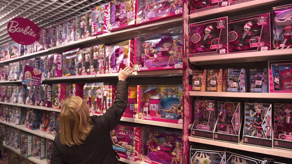 On a crowded toy shelf, making room for a new era of Barbie image