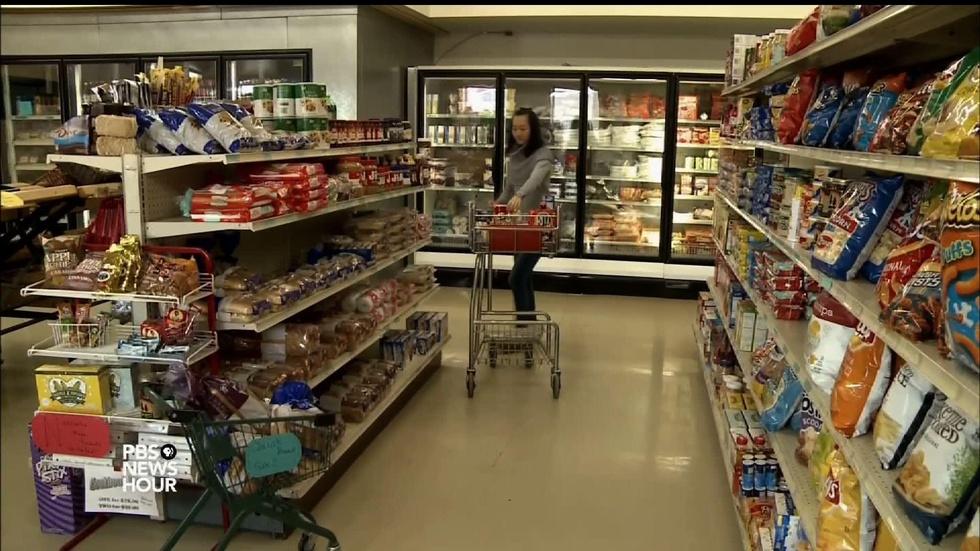 Students running small-town market know business image