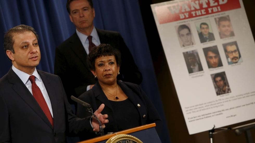 News Wrap: U.S. indicts 7 hackers for attacks on banks image