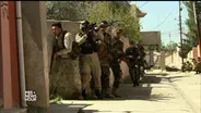 Iraqi Christians face choice of flight or fight