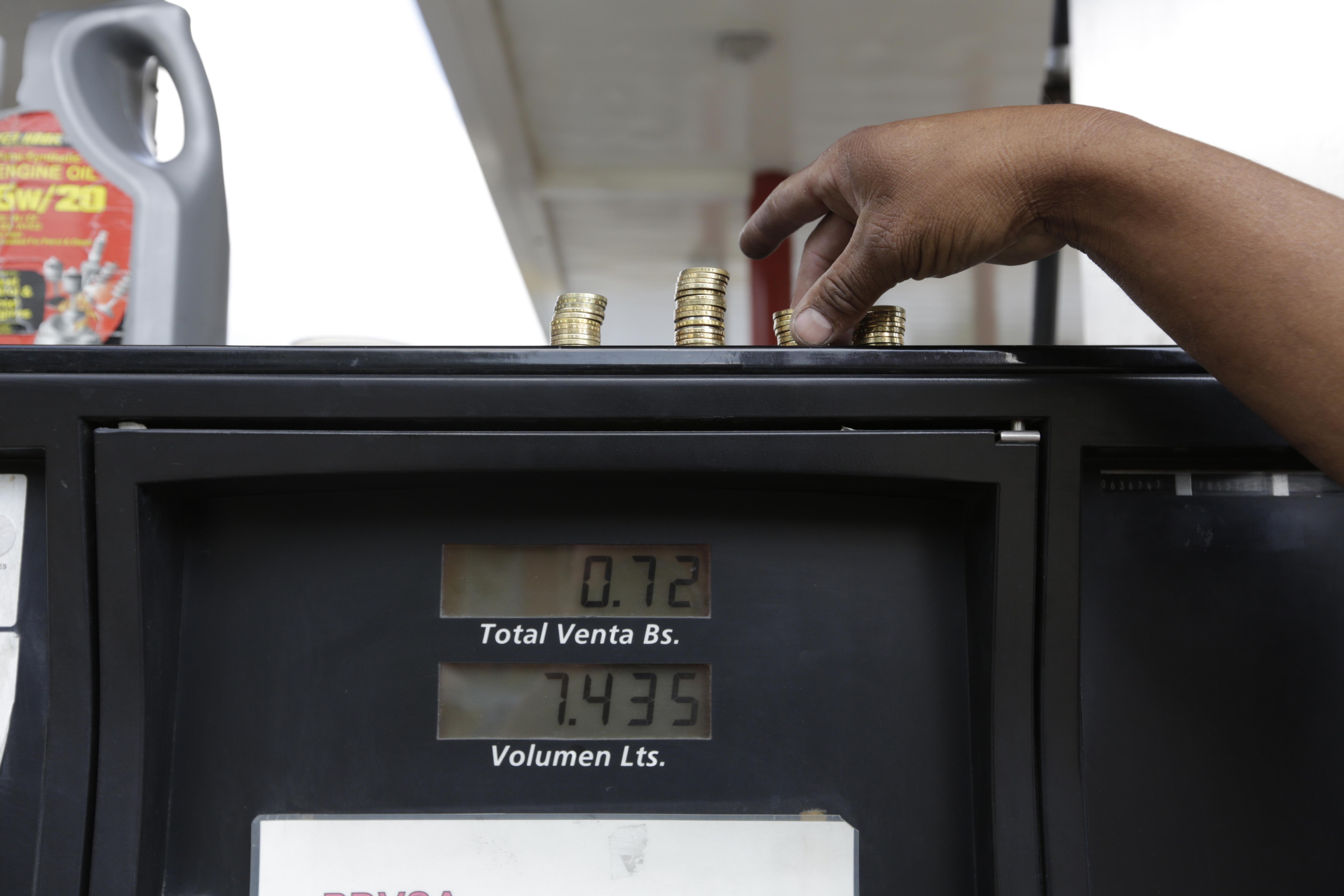 Oil-rich Venezuela suffers as global prices plummet