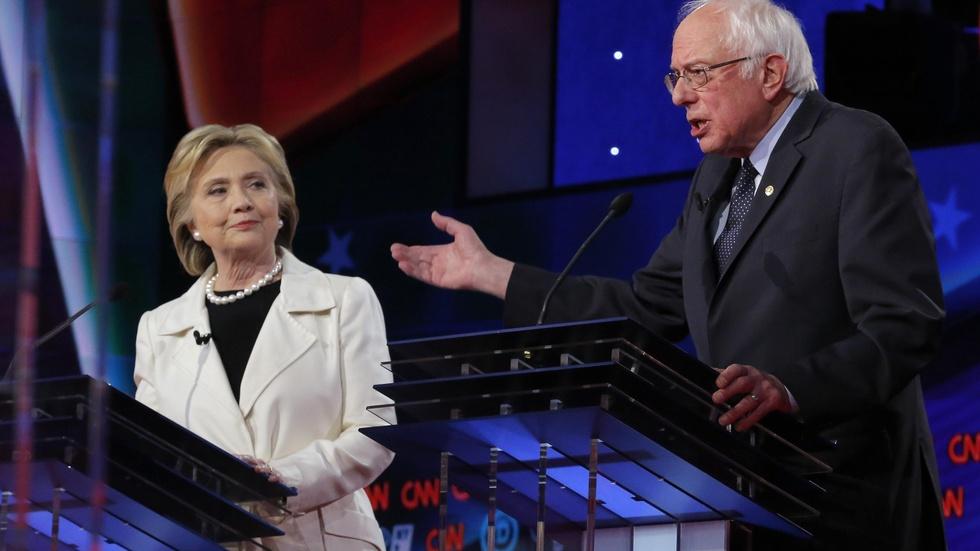 Clinton, Sanders spar in debate; GOP argues over delegates image