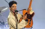Watch Prince wail on ‘While My Guitar Gently Weeps’